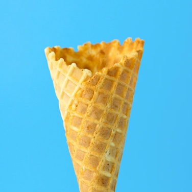 one ice cream cone with background blue